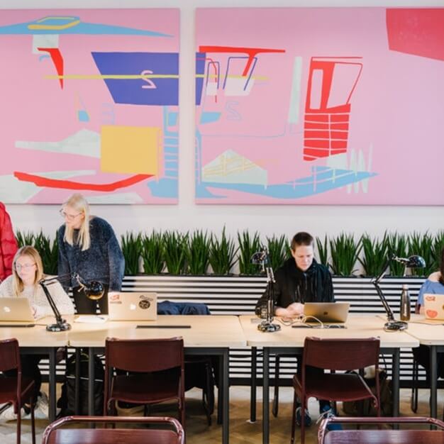 The shared deskspace at The Hanover Building, WeWork in Manchester